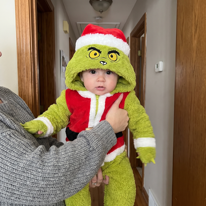 Parent holding a baby in the My Cozy Grump onesie