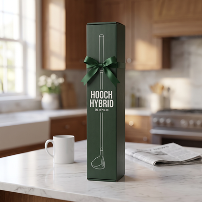 Hooch Hybrid green gift box, The 15th Club, with a ribbon on a kitchen counter